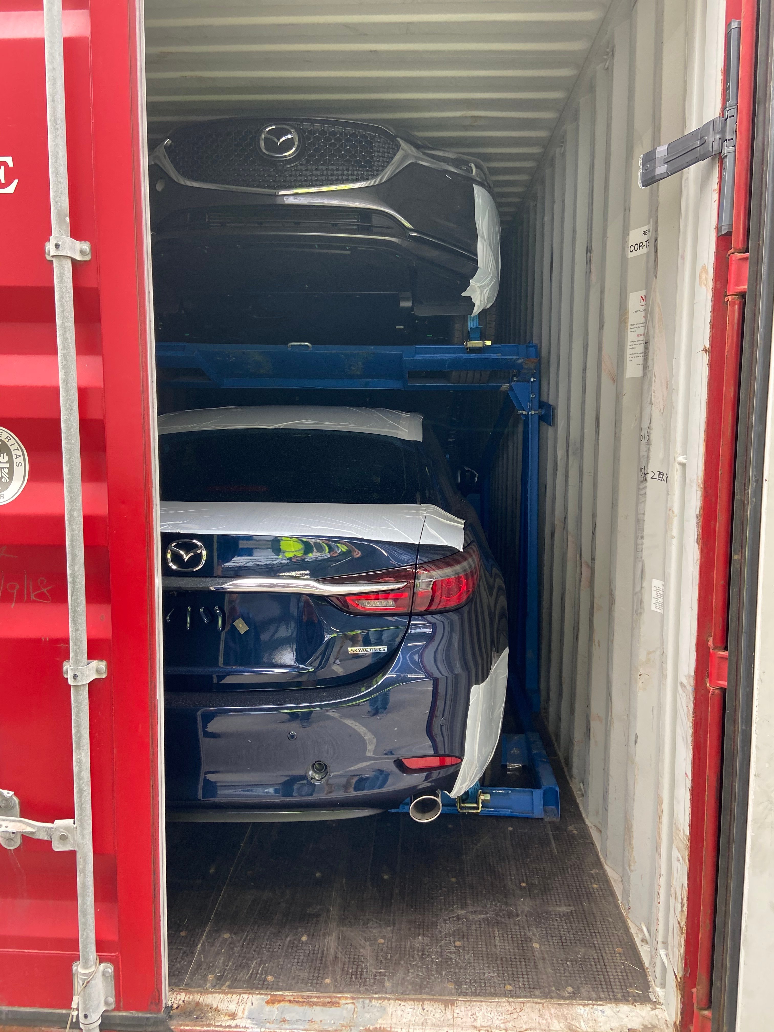 Mazda shipping container unloading