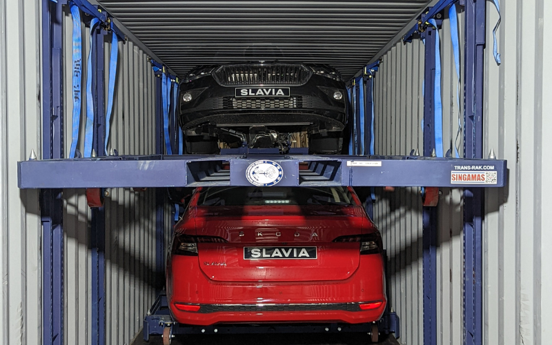Two cars in a shipping container using the new P-RAK Pallentised Cargo Racking System