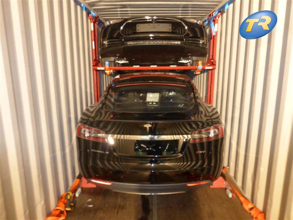 Tesla vehicles loaded onto Trans-Rak's certified, engineered R-RAK system in a shipping container.