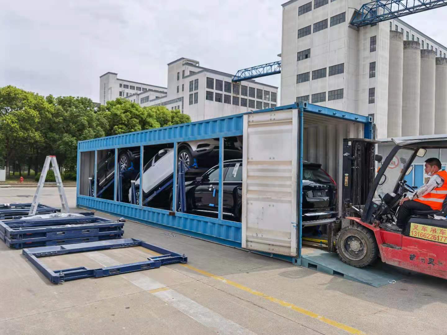 Automotive transport and storage operations, showcasing finished vehicle racking for efficient global vehicle logistics management.