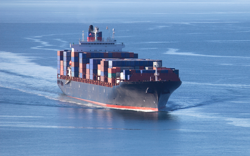A large container shipping ship representing reduced emissions for containerised shipping